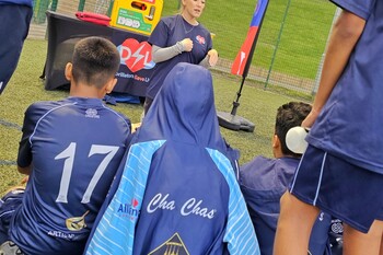Heart Hero and Trustee Ash teaching at football